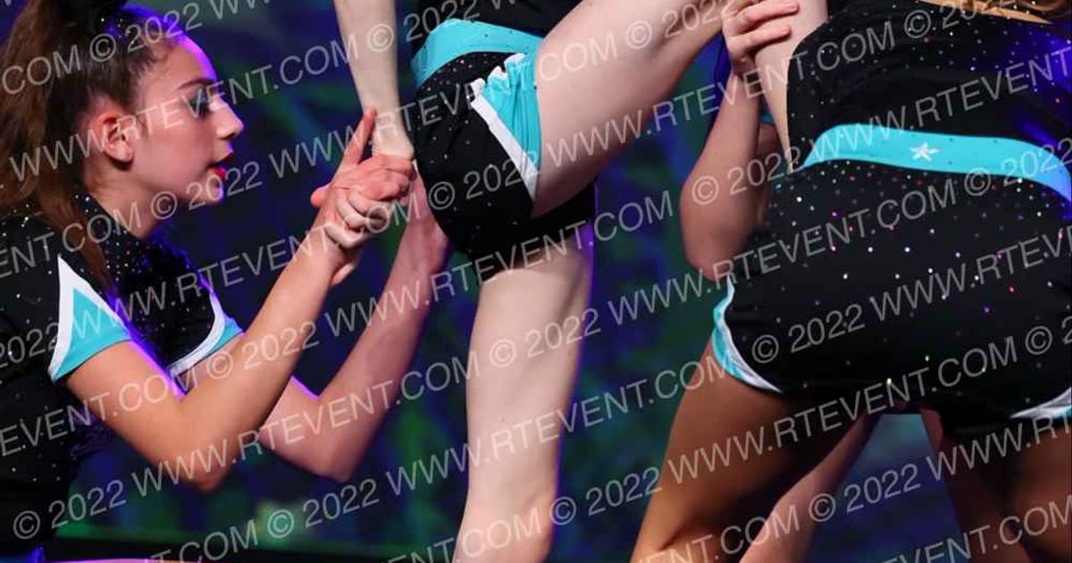 Cheer Sport Sharks - Kitchener Neon Sharks · Feel the Power
