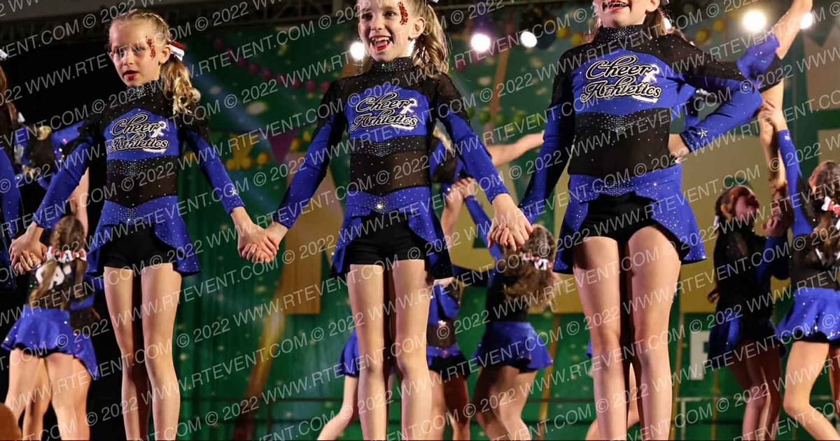 Cheer Athletics Emerald Coast Emerald City Kitties · Mardi Gras Biloxi Showdown