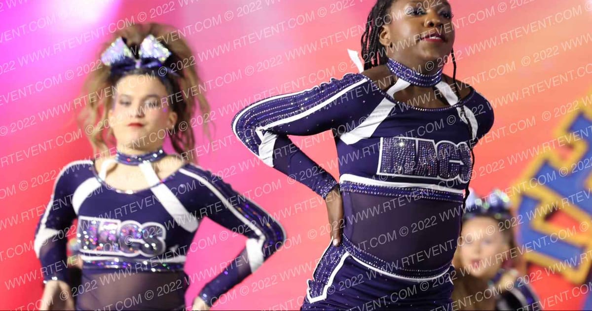 Macs Allstar Cheer MACS REIGN · The American Celebration