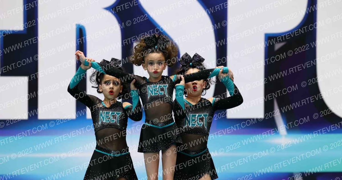 New England Cheer & Tumble Mini Black Pearls · CS Boston