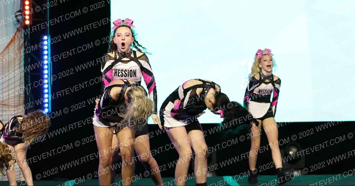 Hession Cheer Academy Pink Dynamit3 · The Midwest Regional Summit