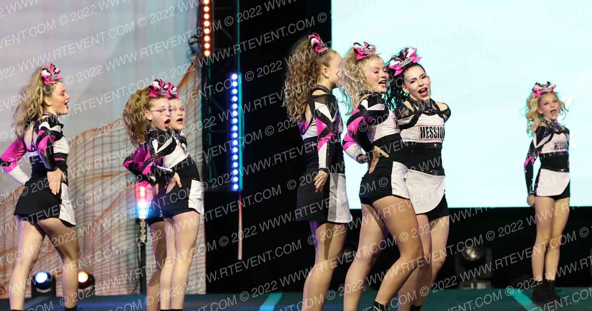 Hession Cheer Academy Pink Dynamit3 · The Midwest Regional Summit