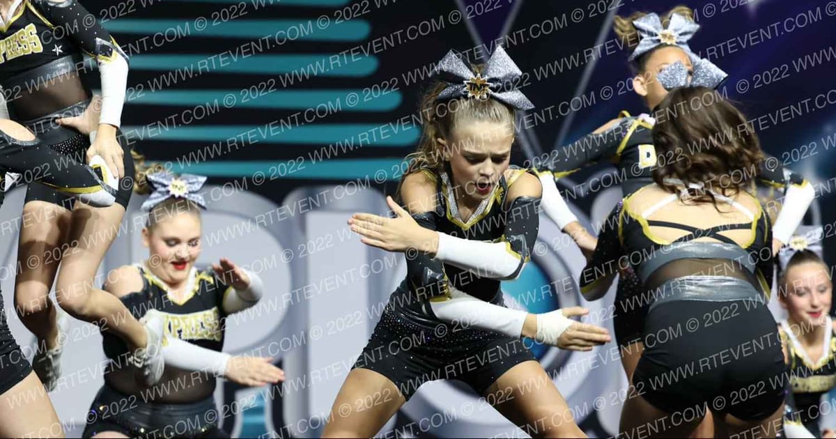 EXPRESS ALLSTARS JUNIOR CHEER TNT · The Champion