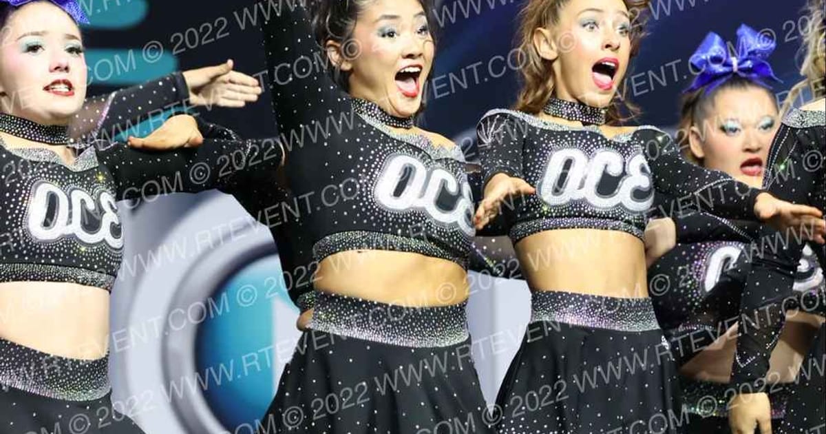 OC ELITE CHEER  DEJA BLUE · The Champion