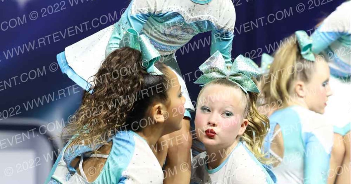 OC ELITE CHEER ISLAND OASIS · The Champion