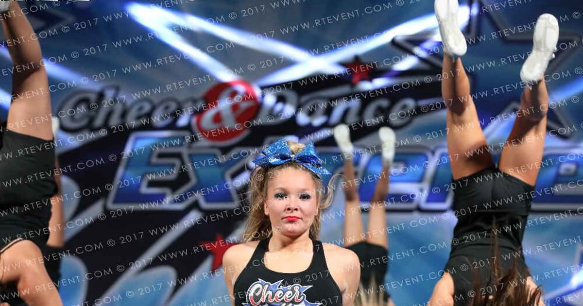 Cheer Challenge Lady Illusion · Holiday Spectacular