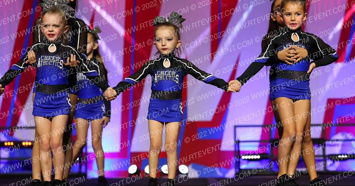 Cheer Athletics - Denver Tiny White · CHAMPS Grand Nationals DIDII
