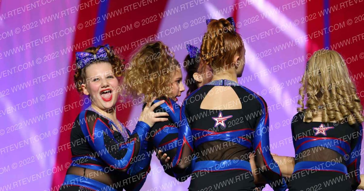 American Cheer Elite Covert · CHAMPS Grand Nationals DIDII