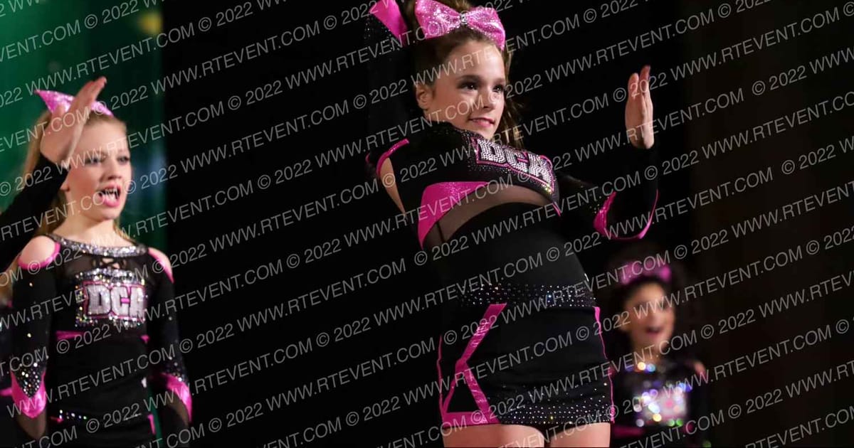 DCA Cheer and Tumbling White Diamonds · Mardi Gras Biloxi Showdown DIDII