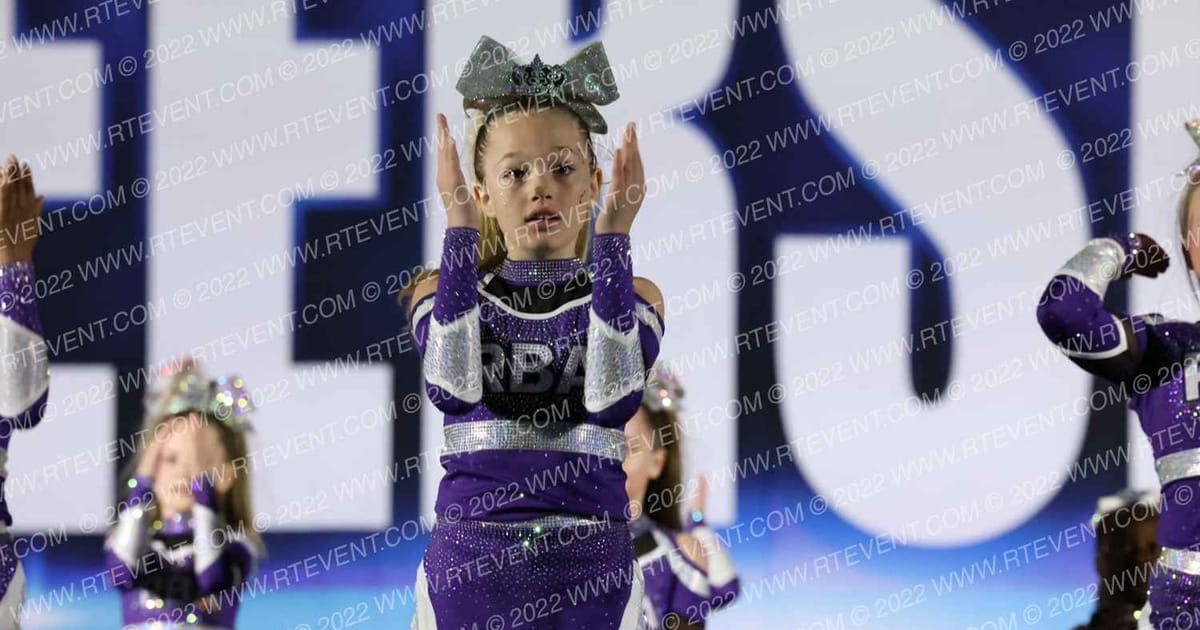 RBA Reign Athletics Silver Flame · Cheersport Sweetheart Raleigh Classic