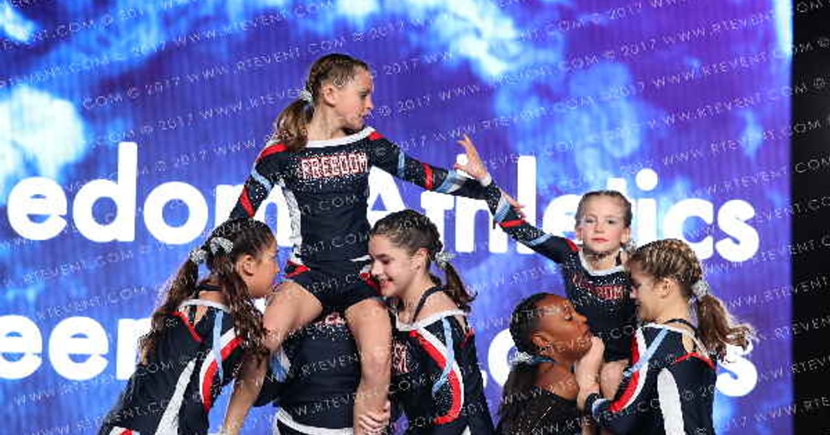 Freedom Athletics Cheer First Ladies · The Grand National Championship