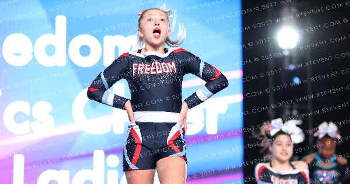 Freedom Athletics Cheer First Ladies · The Grand National Championship