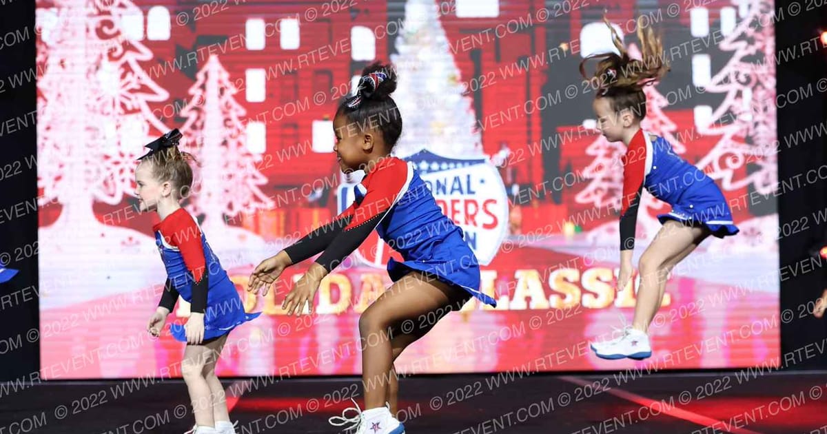 T's Tumbling cosmic cuties · NCA Holiday Classic