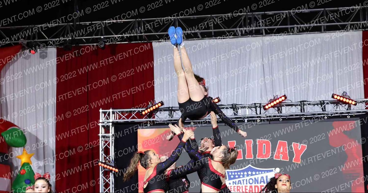 T's Tumbling Platinum Starz · NCA Holiday Classic