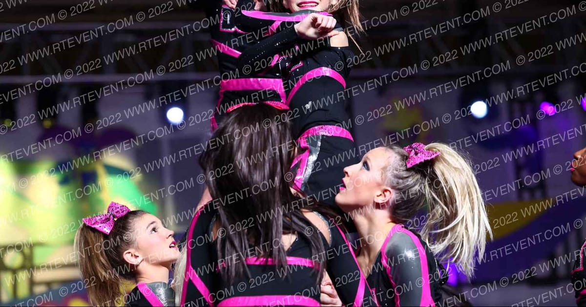DCA Cheer and Tumbling Pink Diamonds · Mardi Gras Grand Nationals