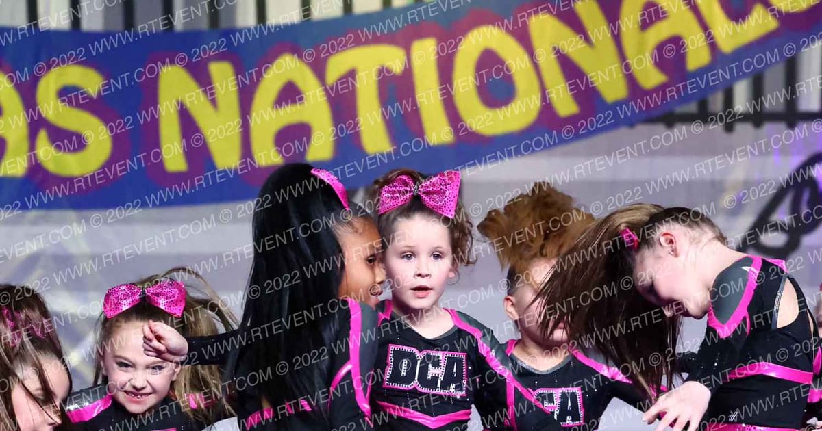 DCA Cheer and Tumbling White   Diamonds · Mardi Gras Grand Nationals