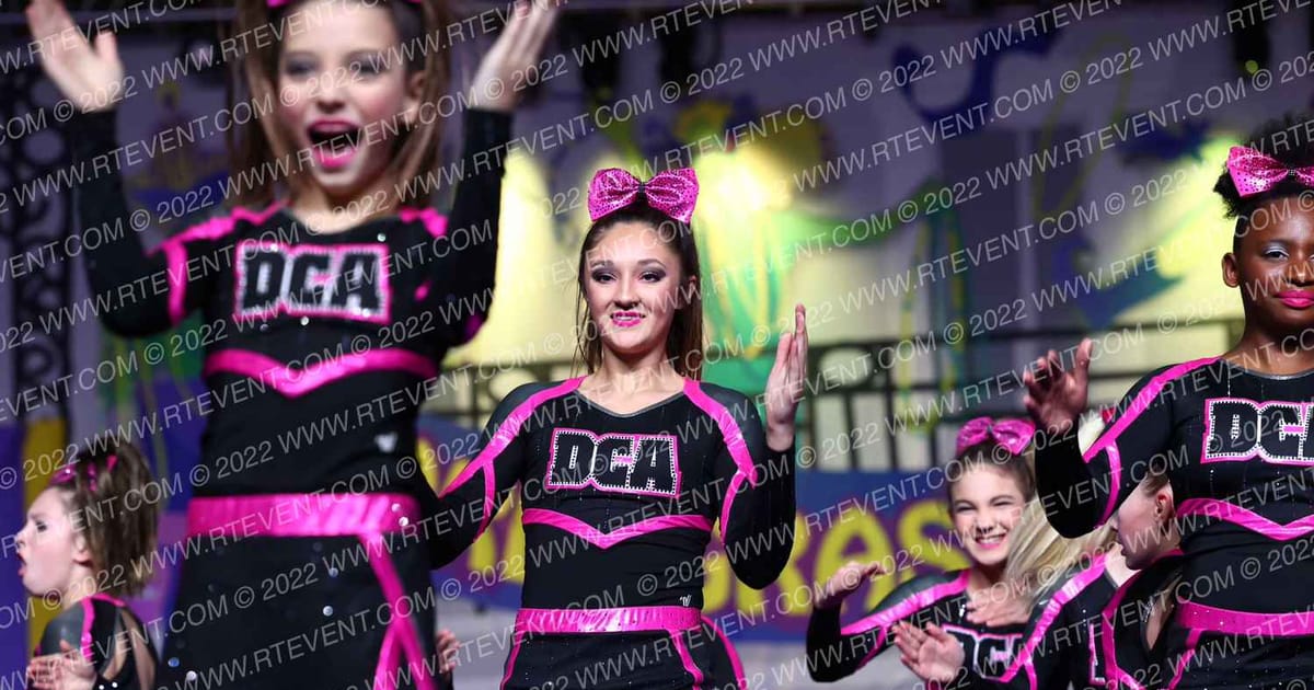 DCA Cheer and Tumbling Pink Diamonds · Mardi Gras Grand Nationals