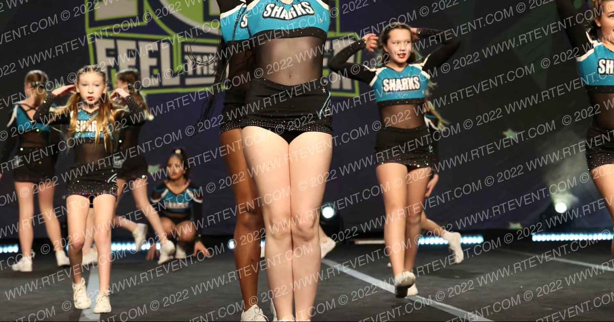 Cheer Sport Sharks - Ancaster Whitespotted · Feel The Power East FIXED