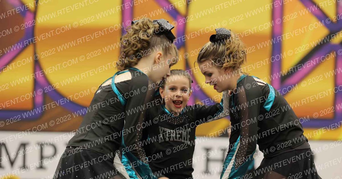 Competitive Cheer Xtreme Emeralds · The Red Hot Cheer and Dance Competition
