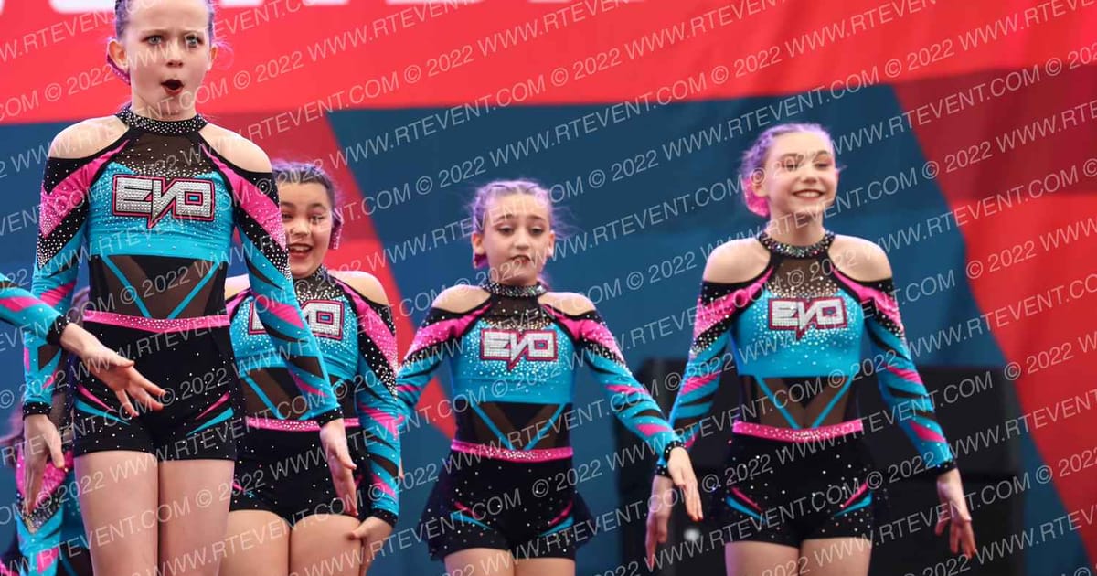 Evolution Cheer Teal Burst · MAC Wildwood Grand Nationals