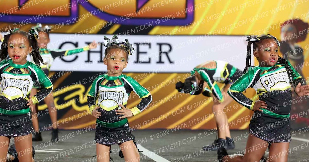 Cougars Competitive Cheer Little Paws · March into the MADness Cheer and Dance Championships