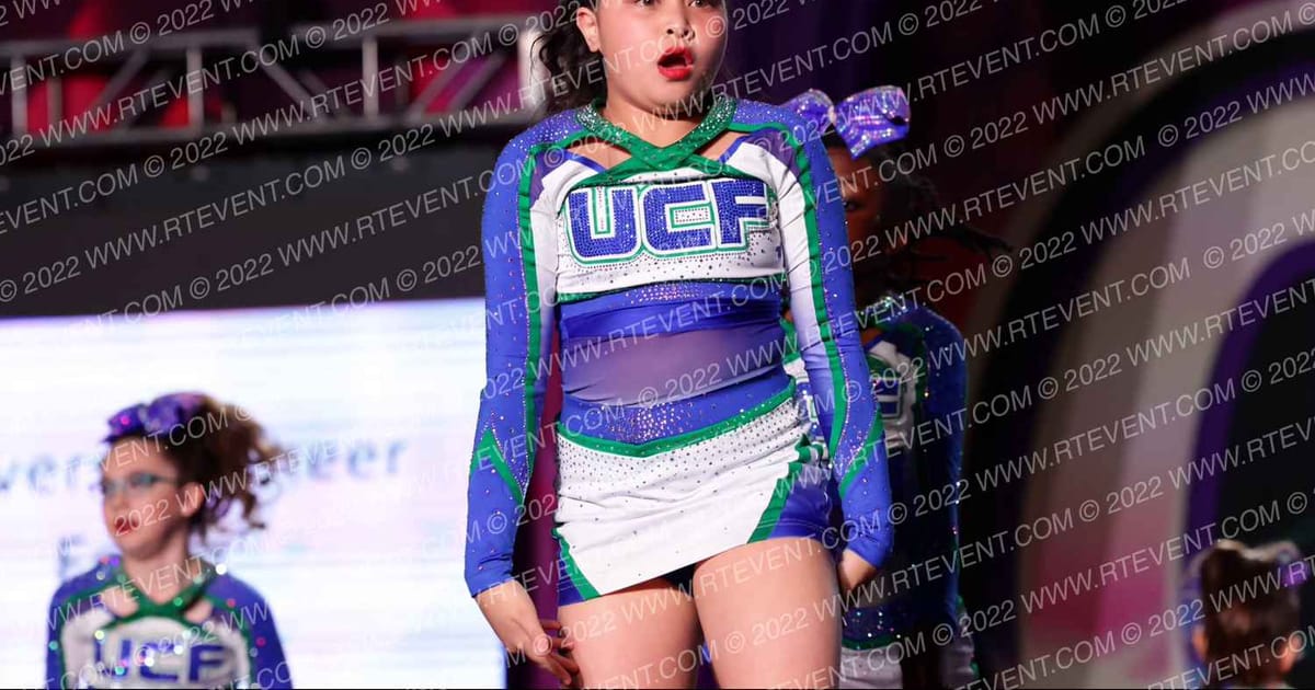 University Cheer Force Mini Quakes · ONE UP Delta A