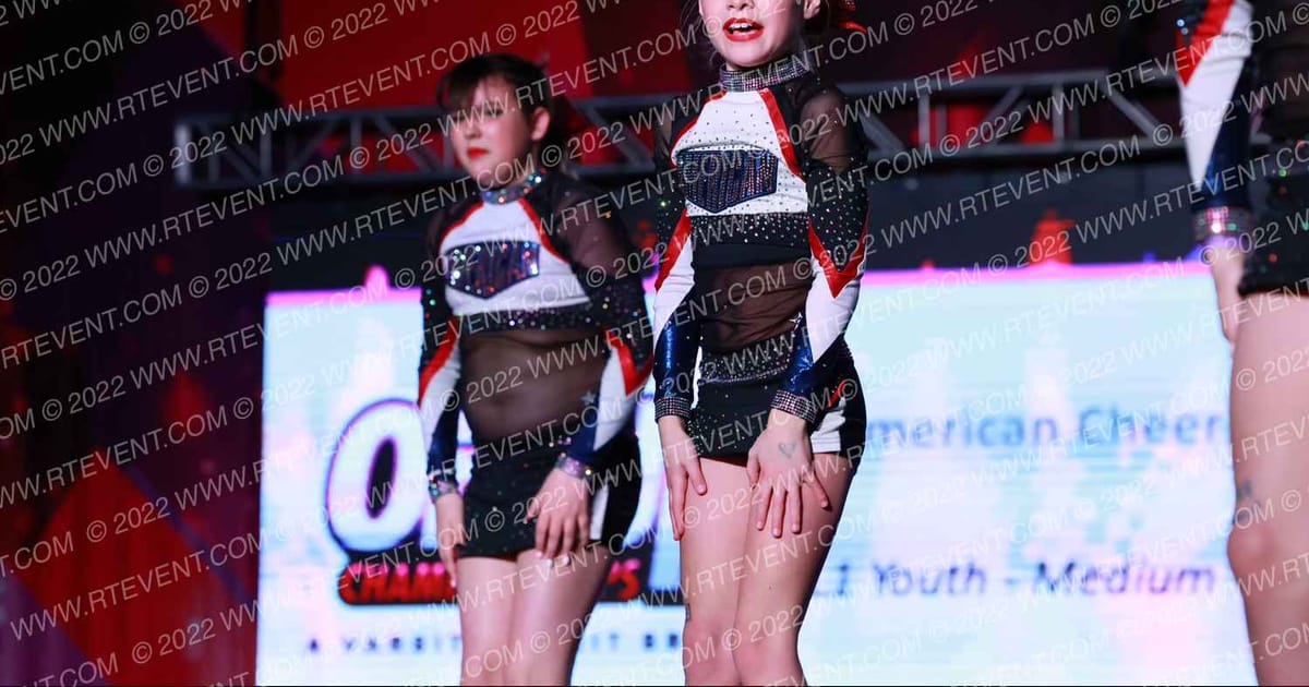 American Cheer YOUTH WHITE · ONE UP Delta A