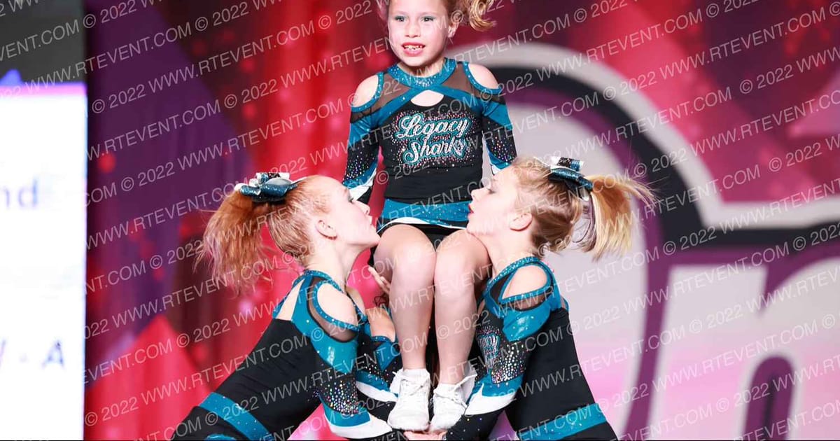 Legacy Cheer and Gymnastics Great Whites · ONE UP Delta D