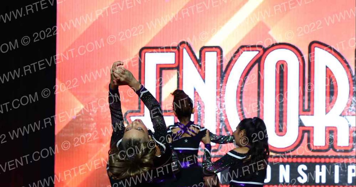 Top Dawg Cheer & Tumbling Purple Reign · Encore Grand Nationals