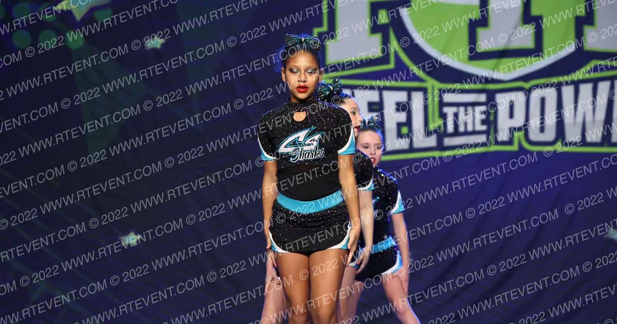Cheer Sport Sharks - Kitchener Neon Sharks · Feel the Power East