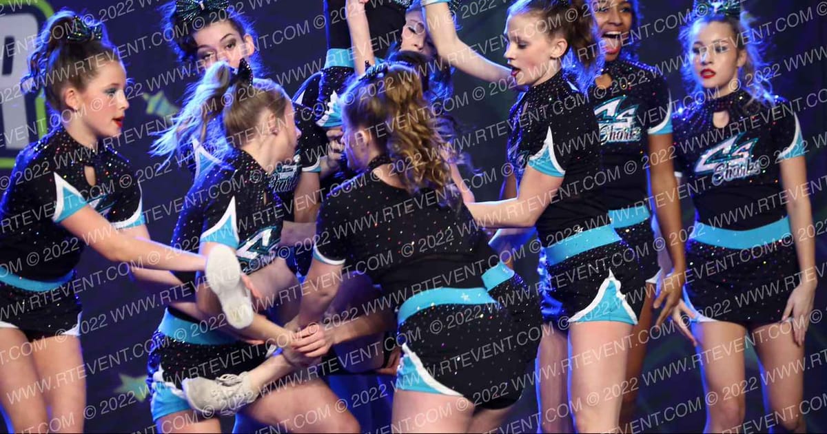 Cheer Sport Sharks - Kitchener White Fin Sharks · Feel the Power East