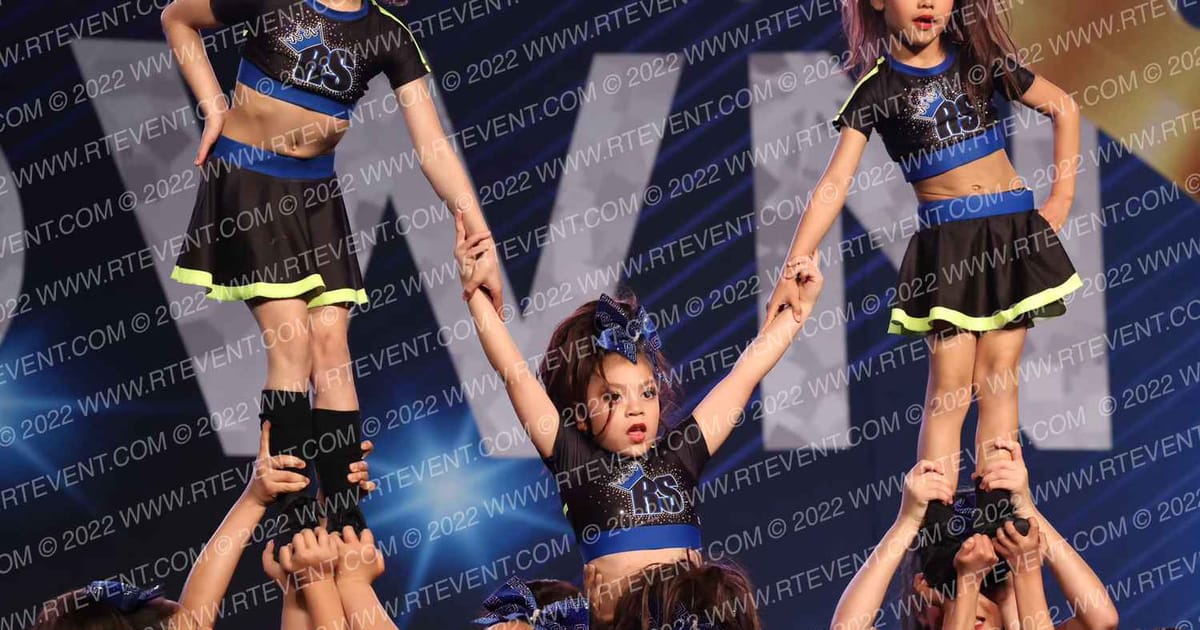 Royal Storm Elite Cheer Lady lightning · Vegas Crown Photo