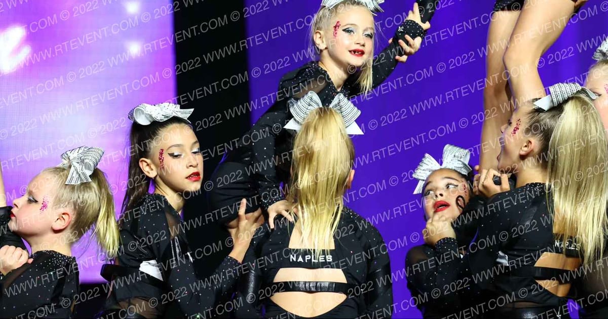 Naples Cheer Revolution Glow · Next Level Nationals
