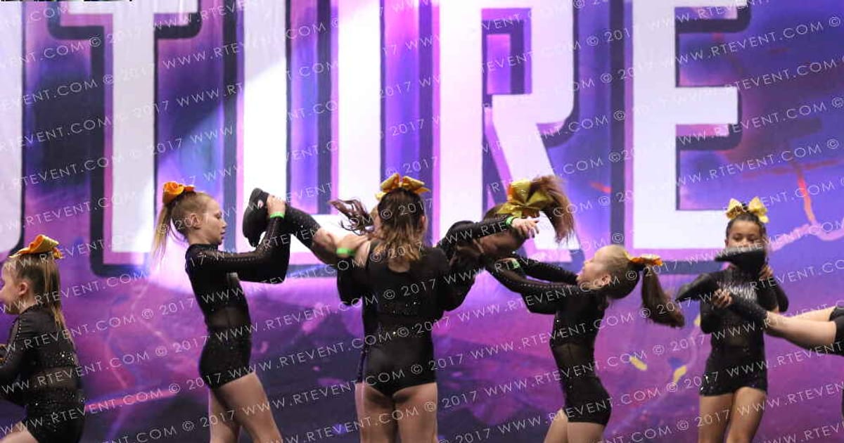 Kick Twist Cheerleading Banana · Own the FloorFC Essentials Nationals Schools Out
