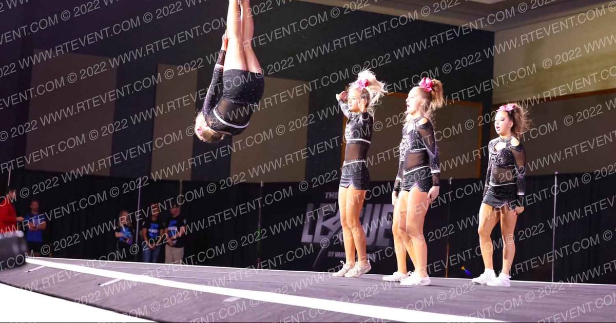 Tribe Cheer Outlaws · CHAMPS Grand Nationals DIDII