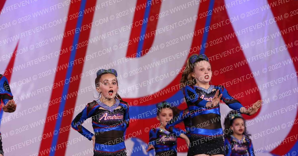 American Cheer Elite Covert · CHAMPS Grand Nationals DIDII