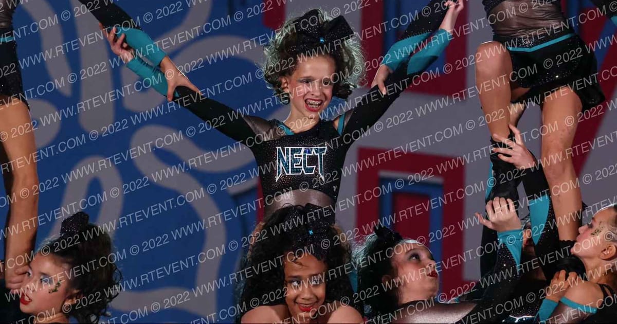 New England Cheer & Tumble Youth Wicked Emeralds · Aloha Worcester Showdown